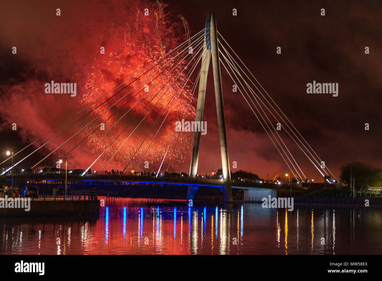 Fireworks over the Marine Way bridge in Southport. Part of the annual fireworks competition. Stock Photo