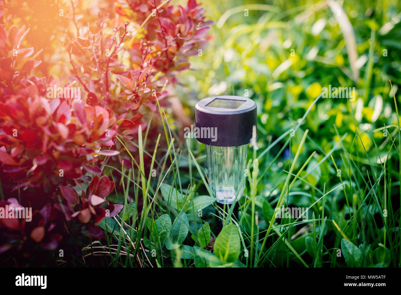 Solar battery light. Garden electric lamp for electricity from solar panels. Stock Photo
