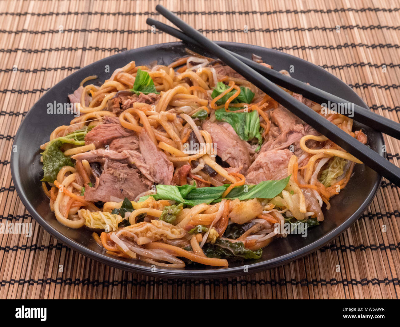 Hoisin duck with noodles Stock Photo - Alamy