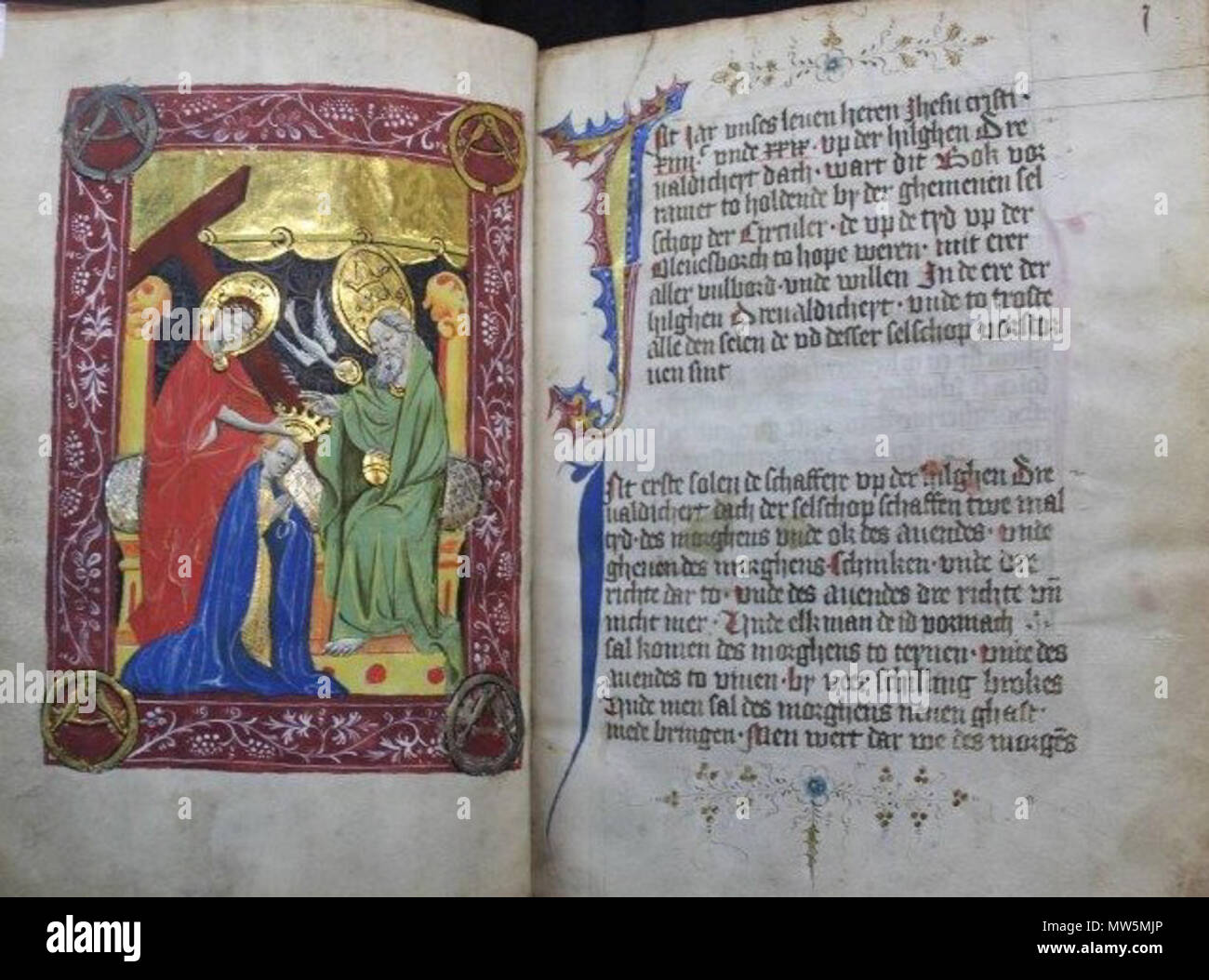 . English: 1426 statutes of the Zirkelgesellschaft (AHL, ZG 1) with a miniature showing the Holy Trinity crowning the virgin Mary . 1426. Unknown 661 Zirkelbuch 1426 Stock Photo