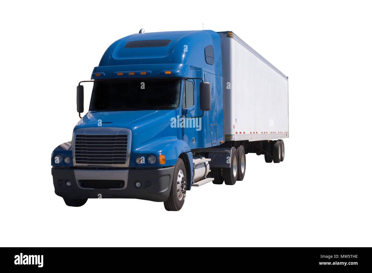 A blue semi truck with a white trailer attached. Isolated on a white background. Clipping path included. Stock Photo