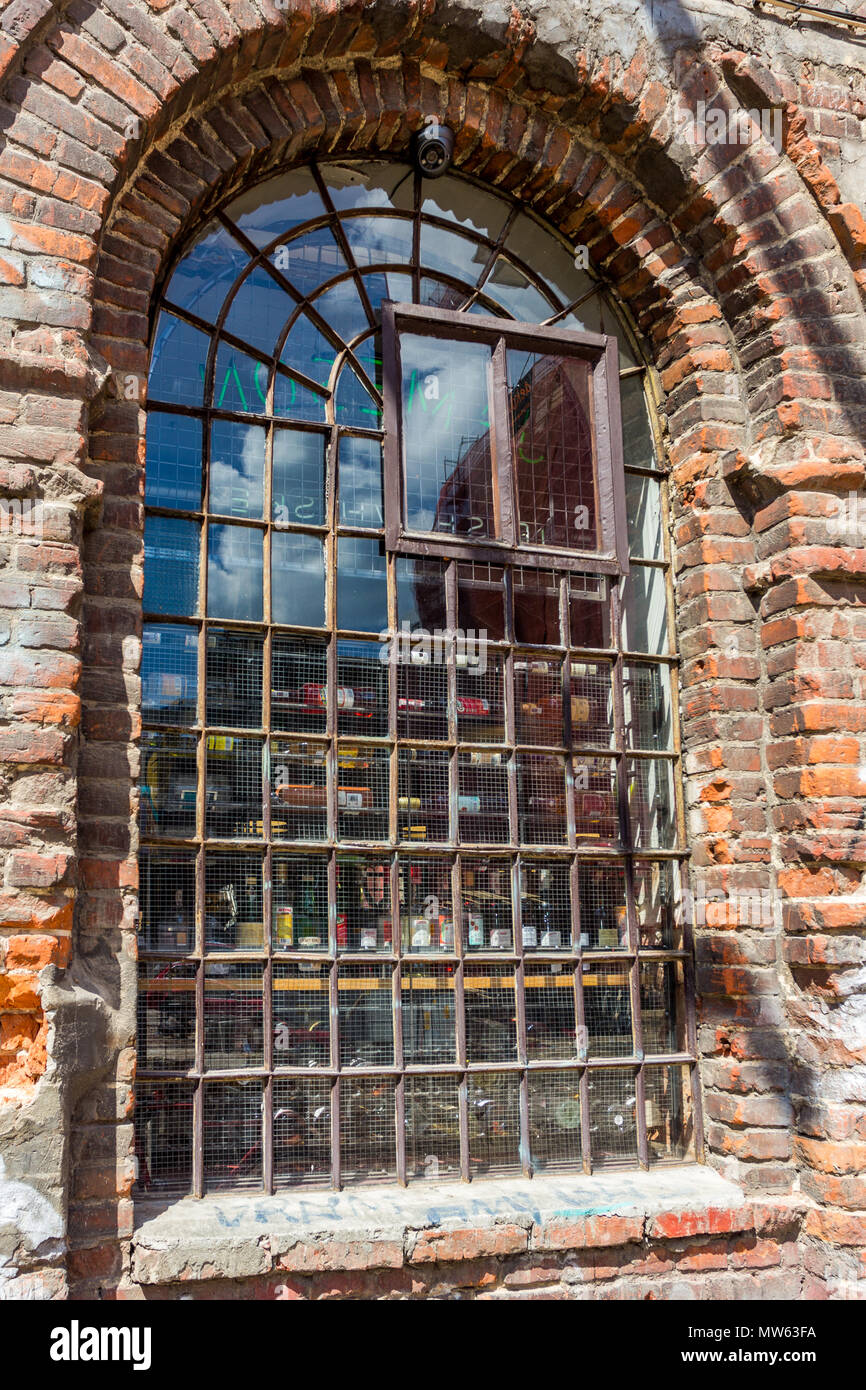 Detail of window frame and grill, off Piotrkowska, Lodz, Poland Stock Photo