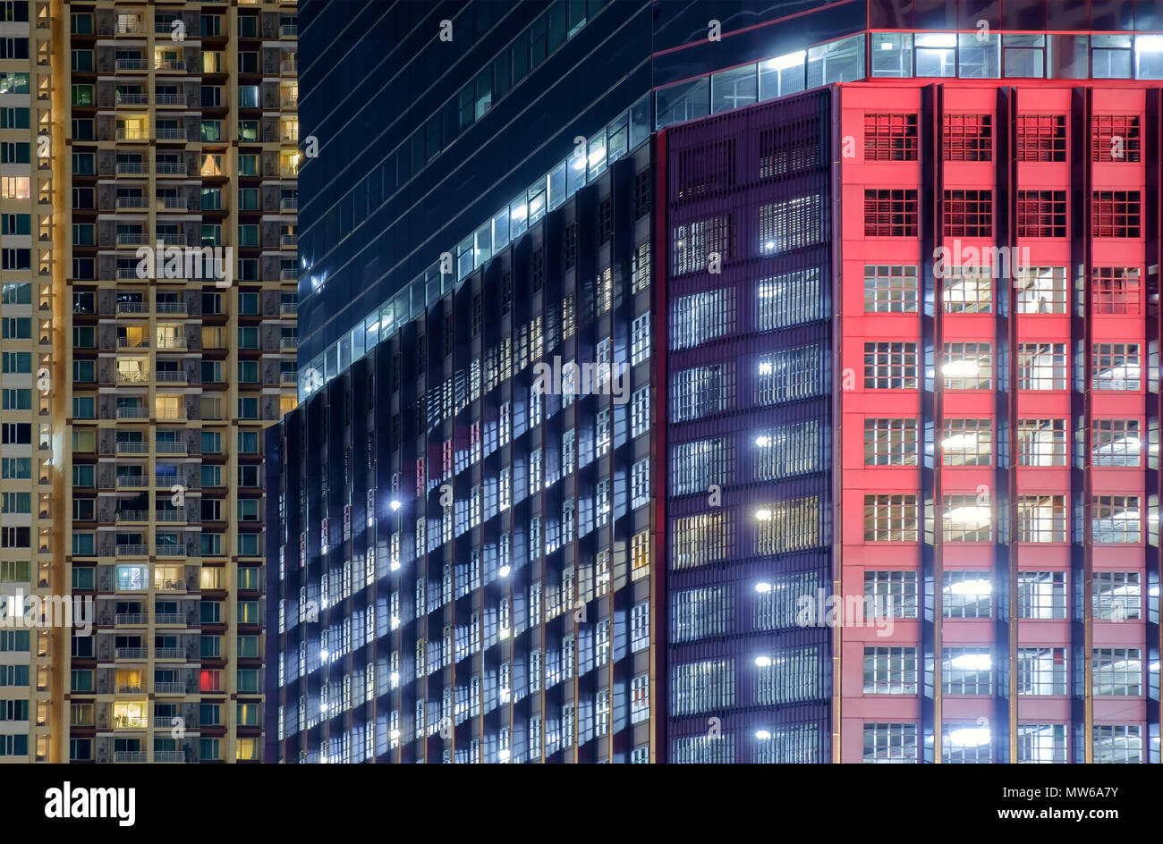 View of balconies of apartment building at night. Stock Photo