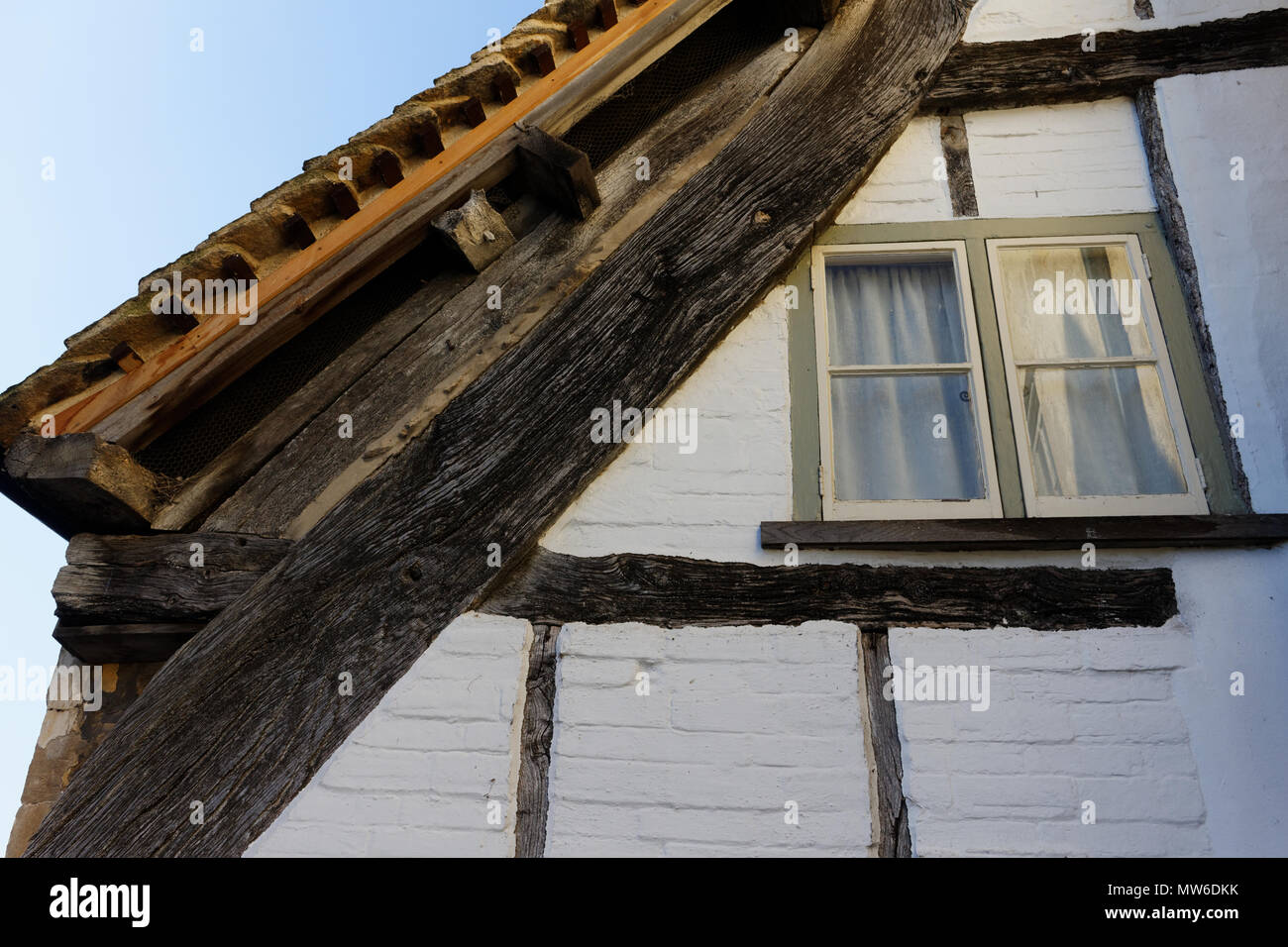 Old stone wall with windows Stock Photo - Alamy