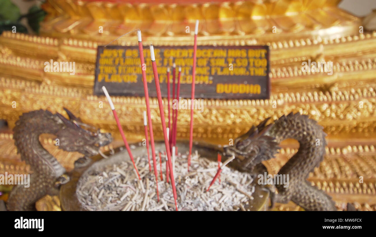 Burning incense sticks in a Buddhist temple on the island of Bali