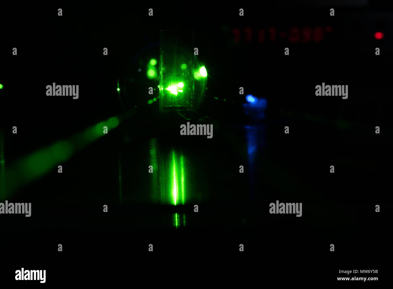 Experiment in photonic laboratory with laser Stock Photo