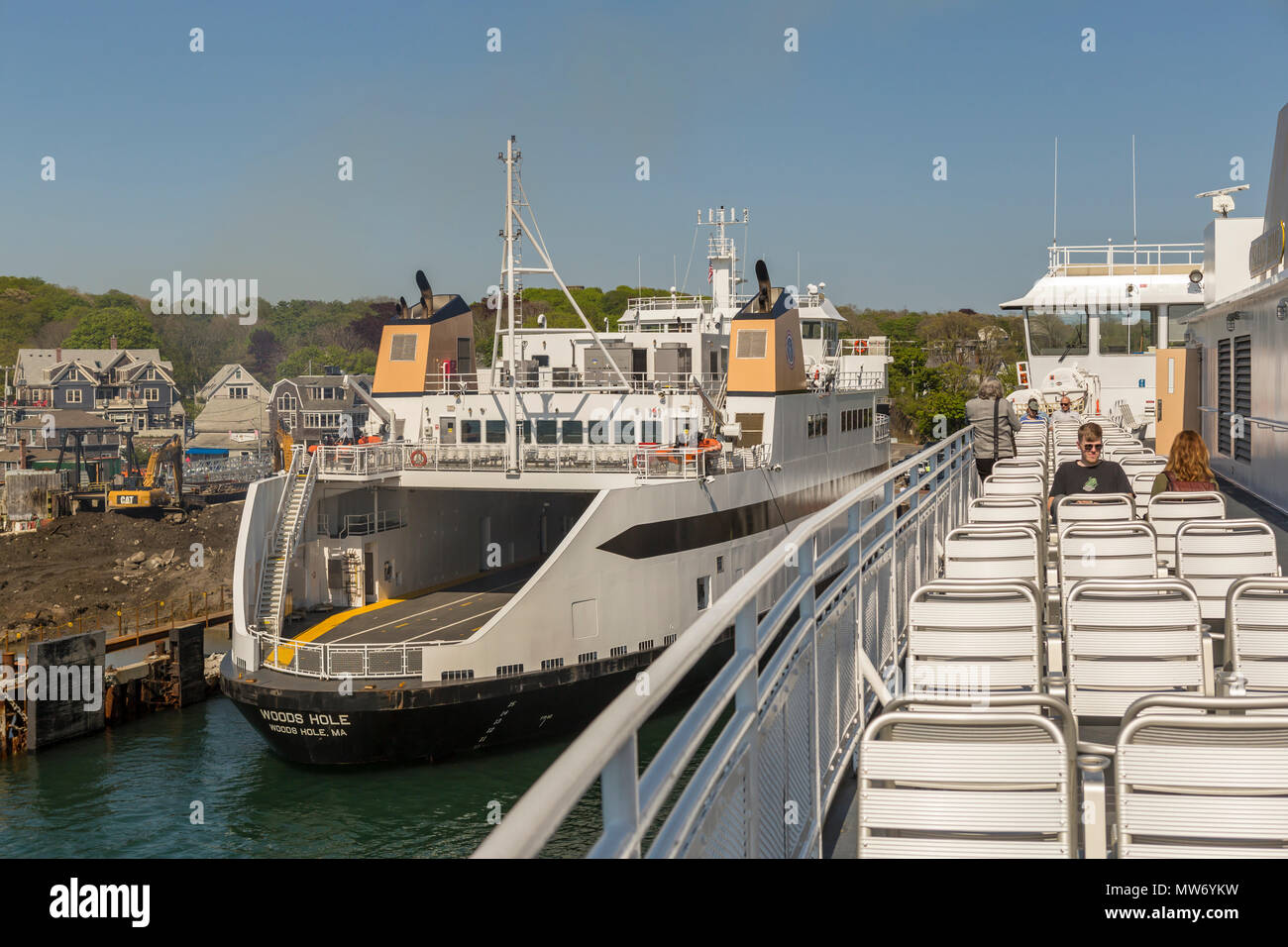 A view from a Steamship Authority ferry as it leaves the ferry terminal in Woods Hole, Massachusetts headed for Martha's Vineyard. Stock Photo