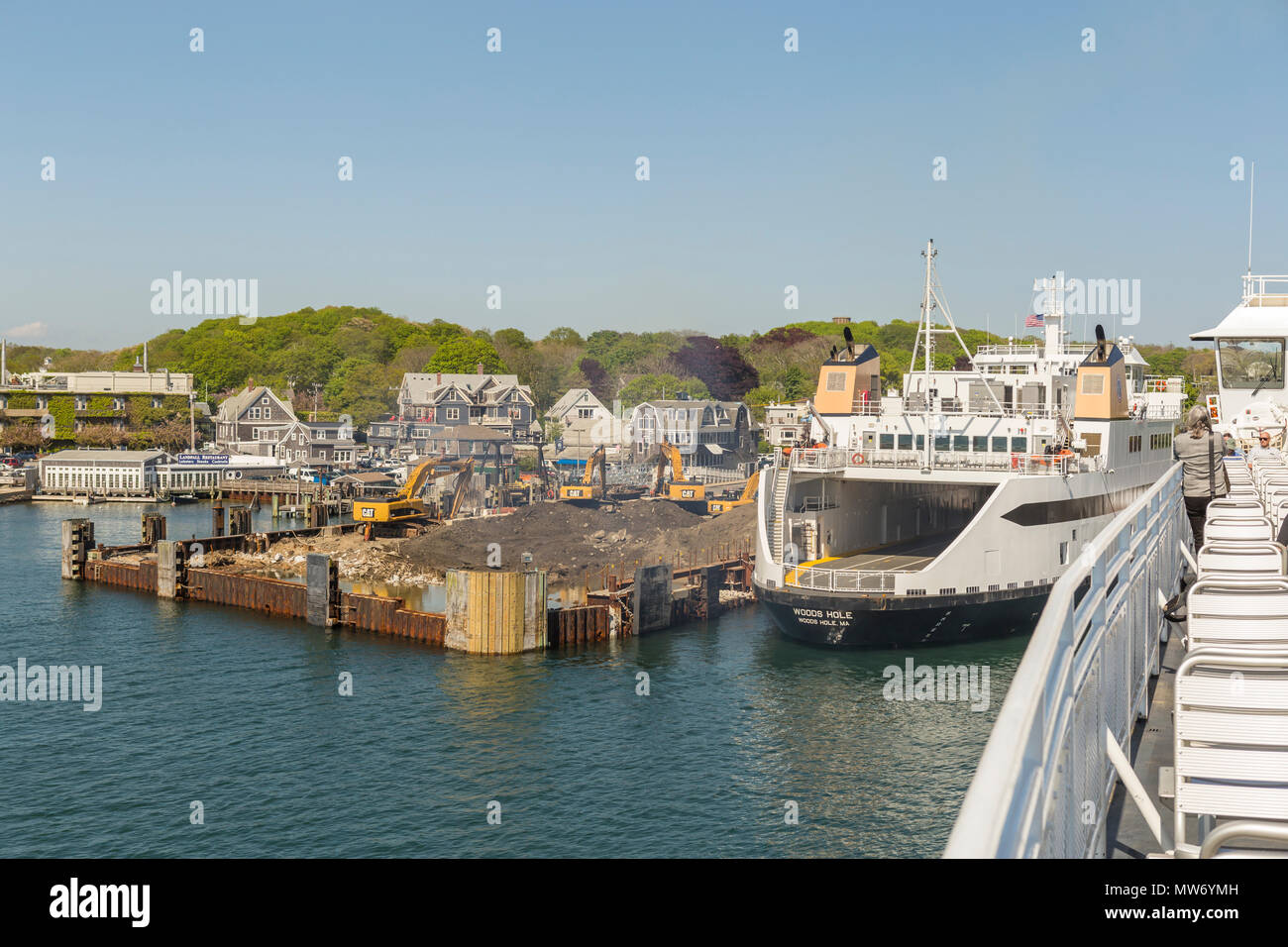 A Steamship Authority ferry passes mass wharf excavation, part of the Woods Hole ferry terminal reconstruction, as it heads for Martha's Vineyard. Stock Photo