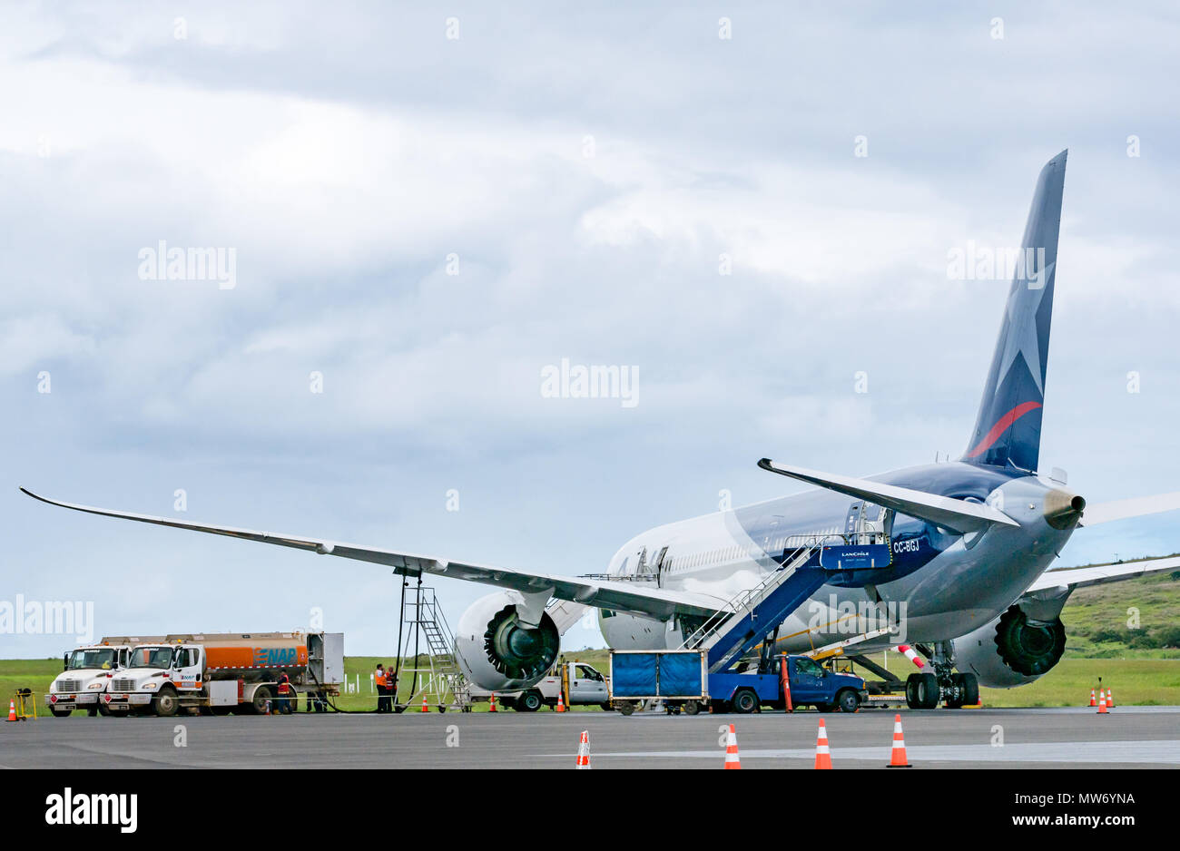 LATAM airline Dreamliner Boeing 787 on airport apron during rainy weather at Mataveri International Airport runway, Easter Island, Chile Stock Photo