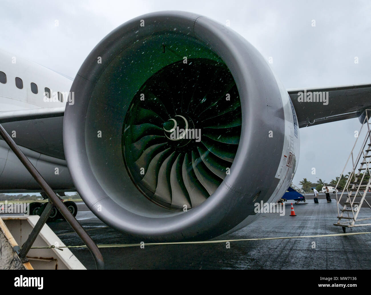 Close up of spinning Rolls Royce engine, LATAM airline Dreamliner Boeing 787 at Mataveri International Airport runway, Easter Island, Chile Stock Photo