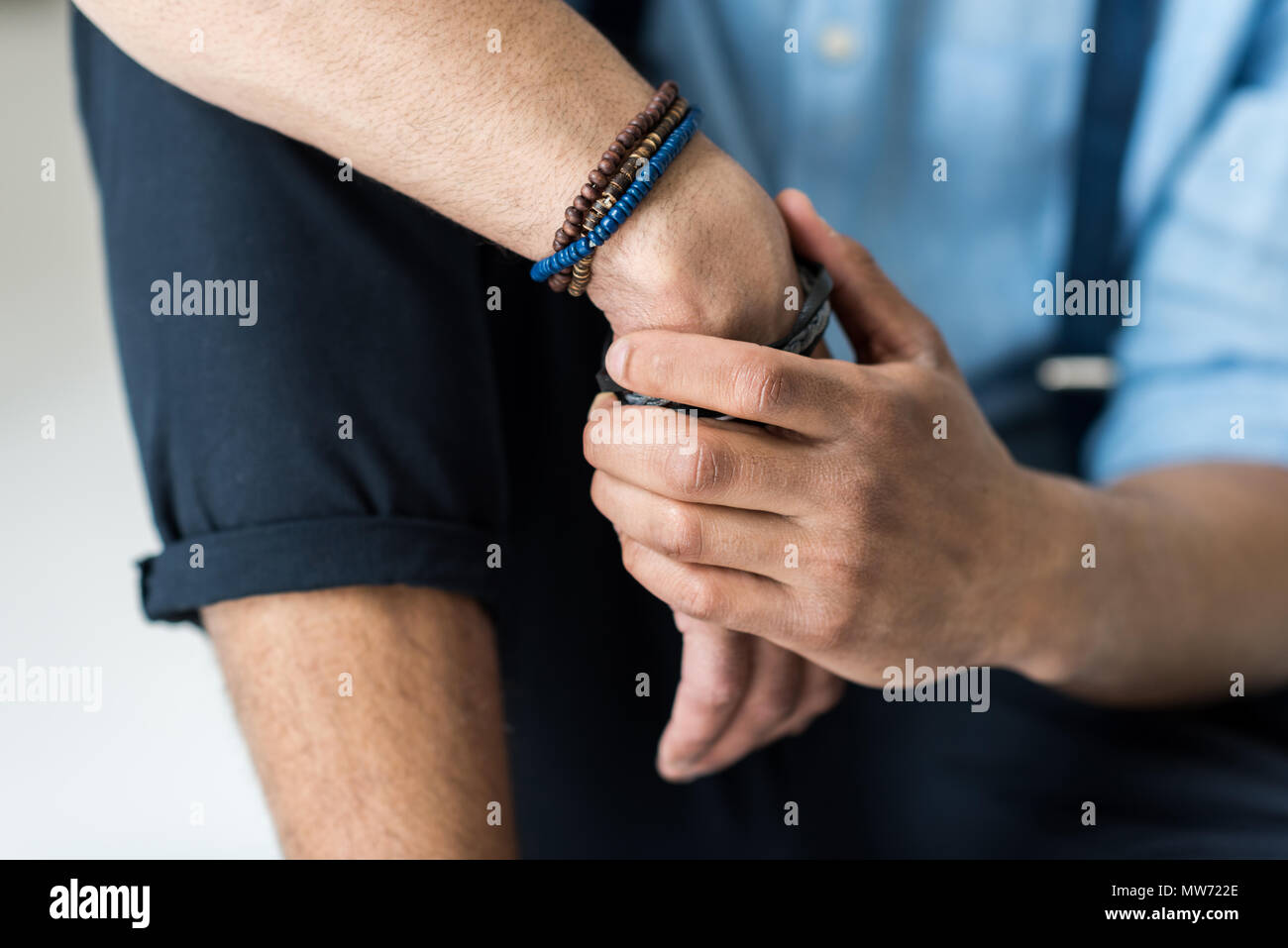 Woman wearing bracelets hi-res stock photography and images - Alamy