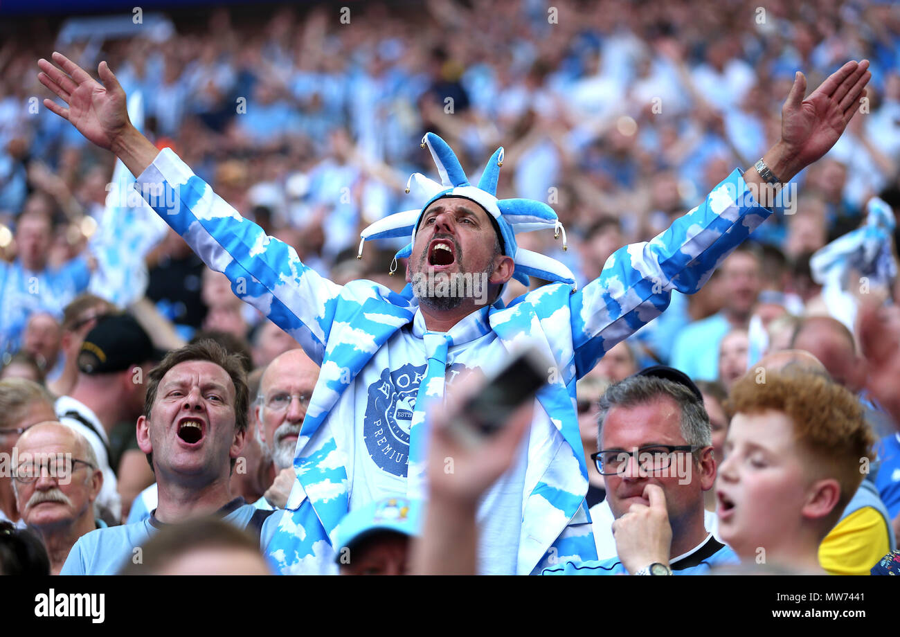 Coventry City fans in the stands show their support Stock Photo - Alamy