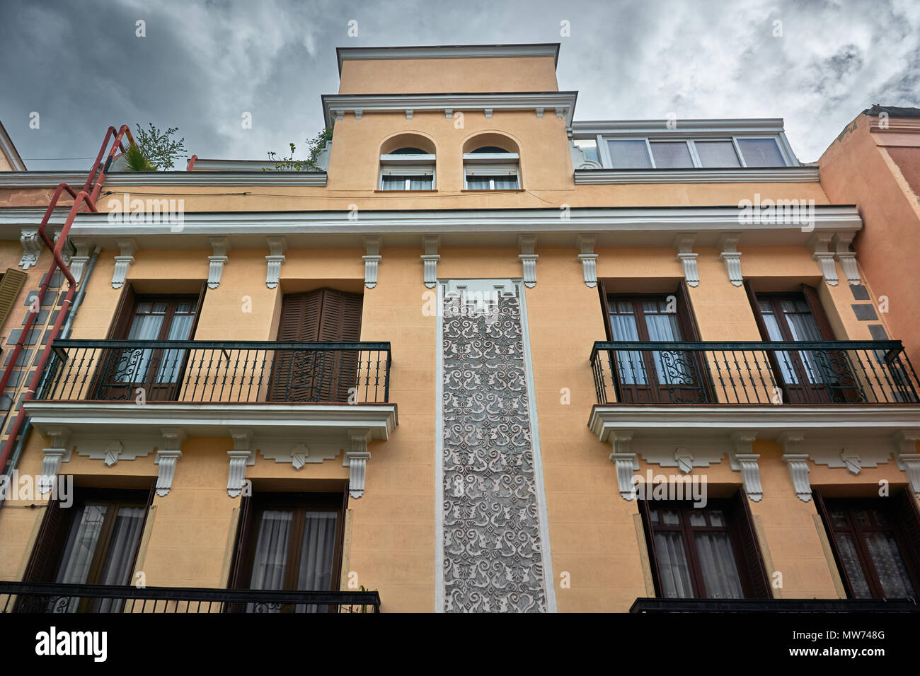 MADRID, SPAIN - APRIL 23, 2018: Details of a generic picturesque building on a street in 'La Latina', a famous neighborhood in Madrid, Spain. Stock Photo