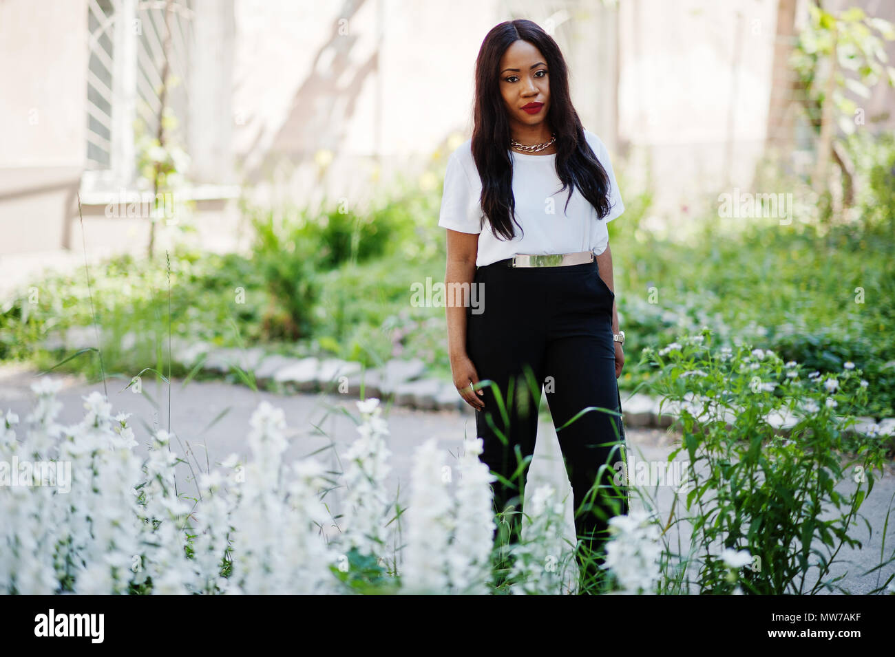 Stylish african american business woman on streets of city Stock Photo ...