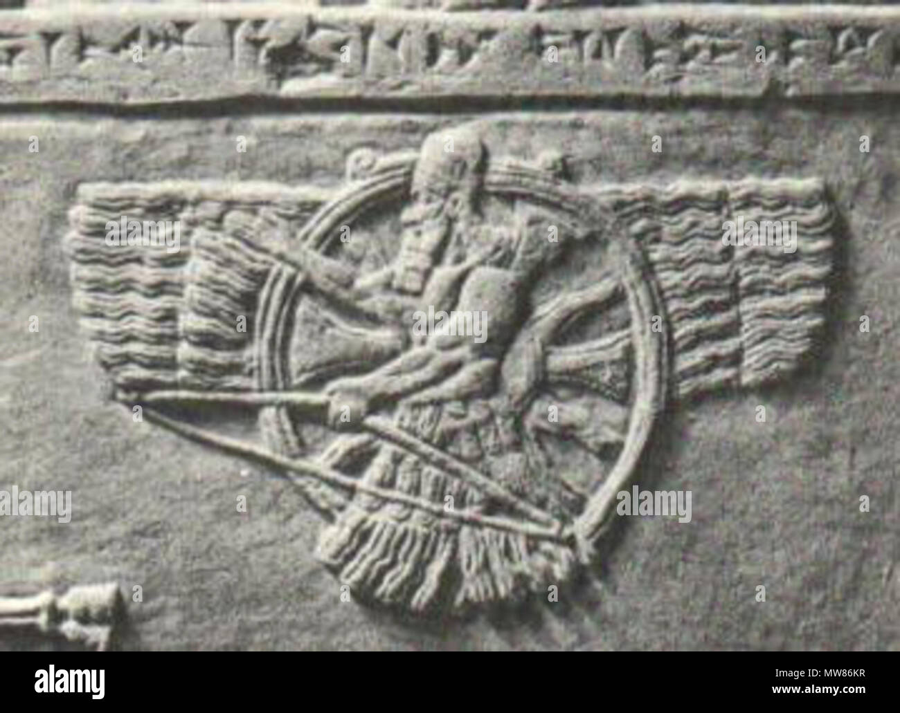 . English: Assyrian 'feather-robed archer' figure, superimposed over a winged sun symbol. [1][2] Myths of Babylonia and Assyria by Donald A. Mackenzie (1915): Ashur was not a 'goat of heaven', but a 'bull of heaven', like the Sumerian Nannar (Sin), the moon god of Ur, Ninip of Saturn, and Bel Enlil. As the bull, however, he was, like Anshar, the ruling animal of the heavens; and like Anshar he had associated with him 'six divinities of council'. Other deities who were similarly exalted as 'high heads' at various centres and at various periods, included Anu, Bel Enlil, and Ea, Merodach, Nergal, Stock Photo