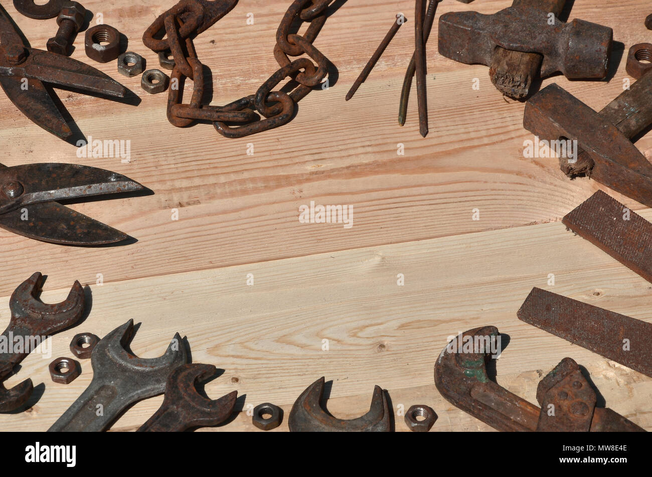 A set of old and rusty tools for handyman. A lot of obsolete household ...