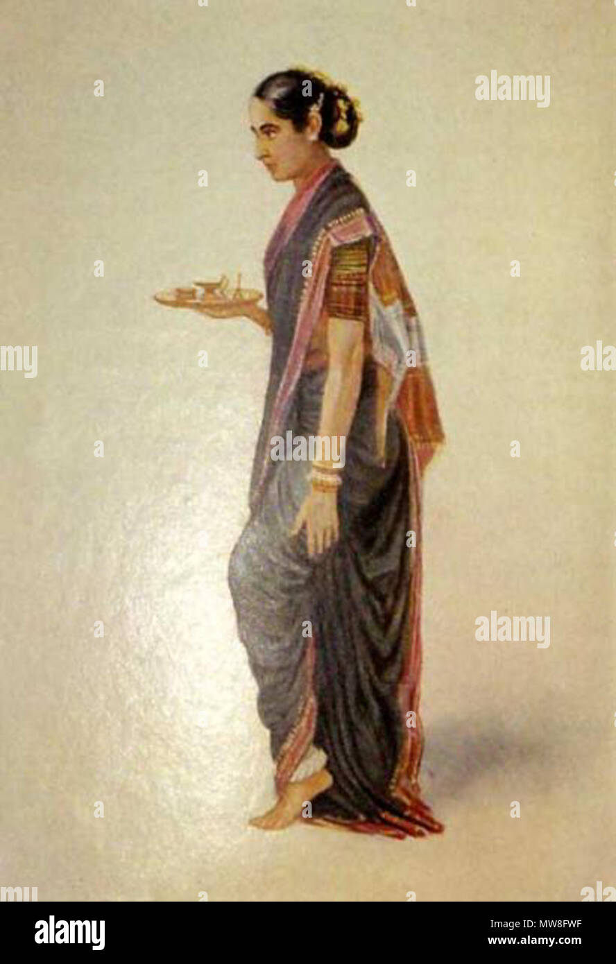 . English: 'A Rajput lady from Kutch,' a watercolor by Rao Bahadur M. V. Dhurandhar, 1928; more watercolors from the set:      *'A working woman at Ajmere'*      *'ABengali lady'*      *'A Bhatia lady'*      *'A Bhil girl'*      *'A Bombay lady'*      *'A Borah lady, Surat'*      *'Born beside the sacred river'*      *'A Brahman lady'*      *'From Burmah'*      *'Cambay type'*      *'A dancer in Mirzapur'*      *'A dancer from Tanjore'*      *'A widow in the Deccan'*      *'A dyer girl, Ahmedabad'*      *'A fisherwoman, Sind'*      *'A fishwife of Bombay'*      *'A denizen of the Western Ghaut Stock Photo