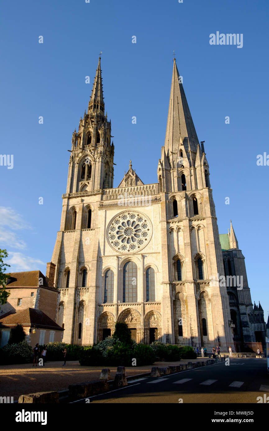 The two contrasting spires at the west facade of Chartres Cathedral France Stock Photo