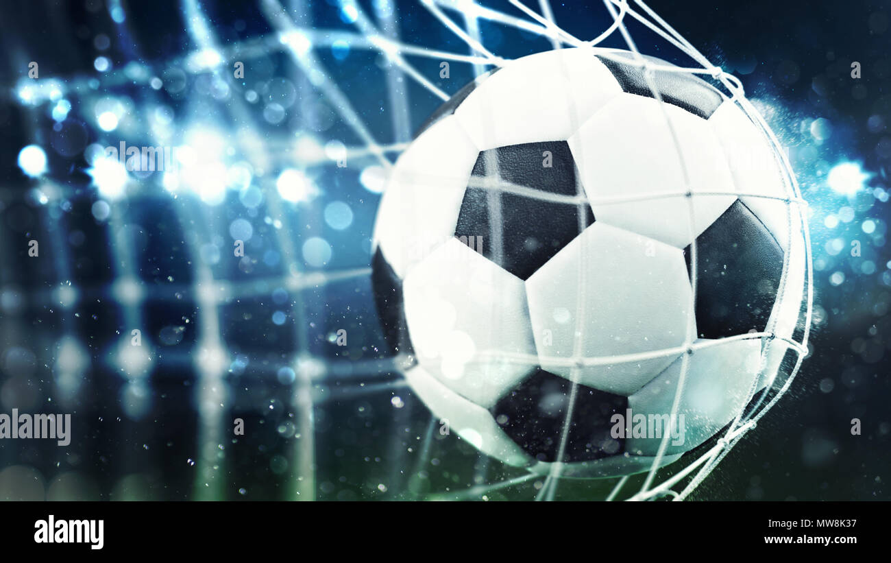 Soccer ball scores a goal on the net. 3D Rendering Stock Photo
