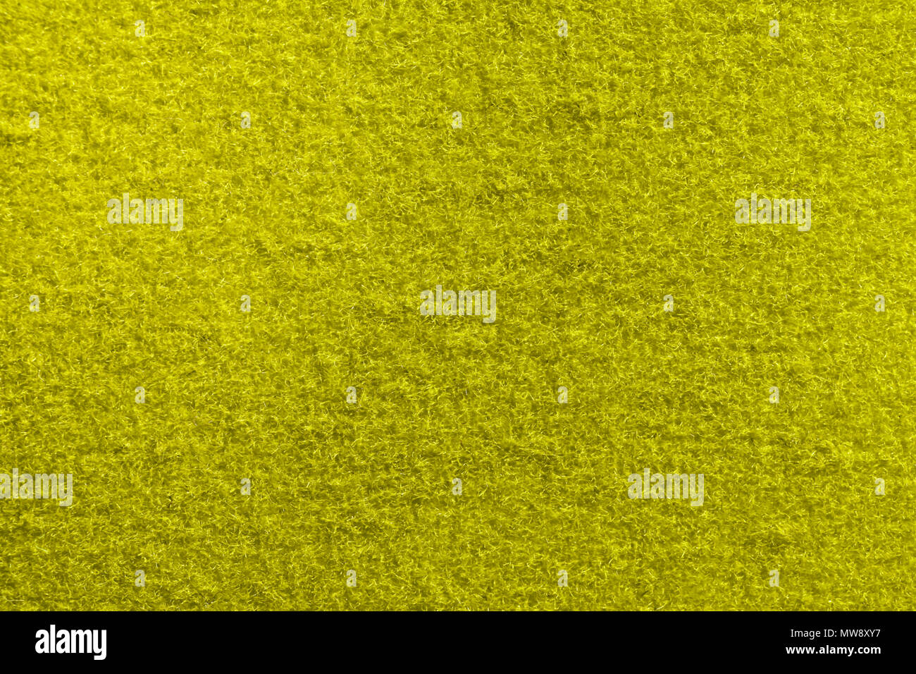 Yellow Fleecy Material Texture. Detailed Fibers Fluffy Surface Background. Stock Photo