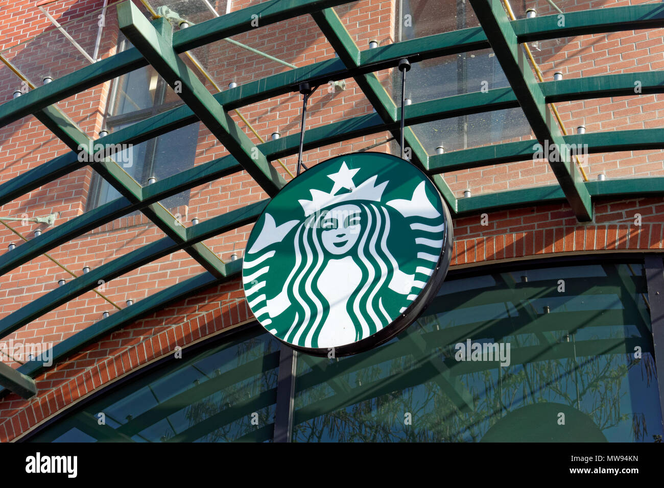Starbucks Coffee shop mermaid logo in Park Royal Village shopping centre, West Vancouver, BC, Canada Stock Photo