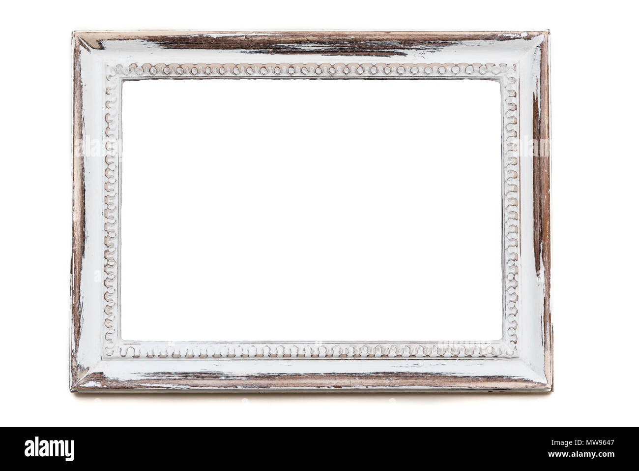 Distressed white painted picture frame. Weathered white timber Stock