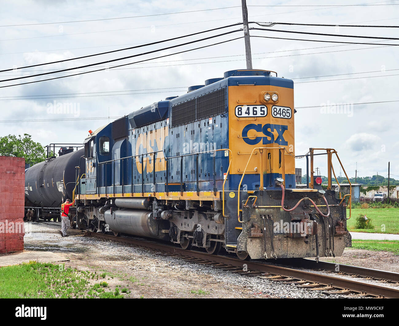 CSX Transportation locomotive, EMD SD40-2, #8465, in switching yard pushing freight cars, in Montgomery Alabama, USA. Stock Photo