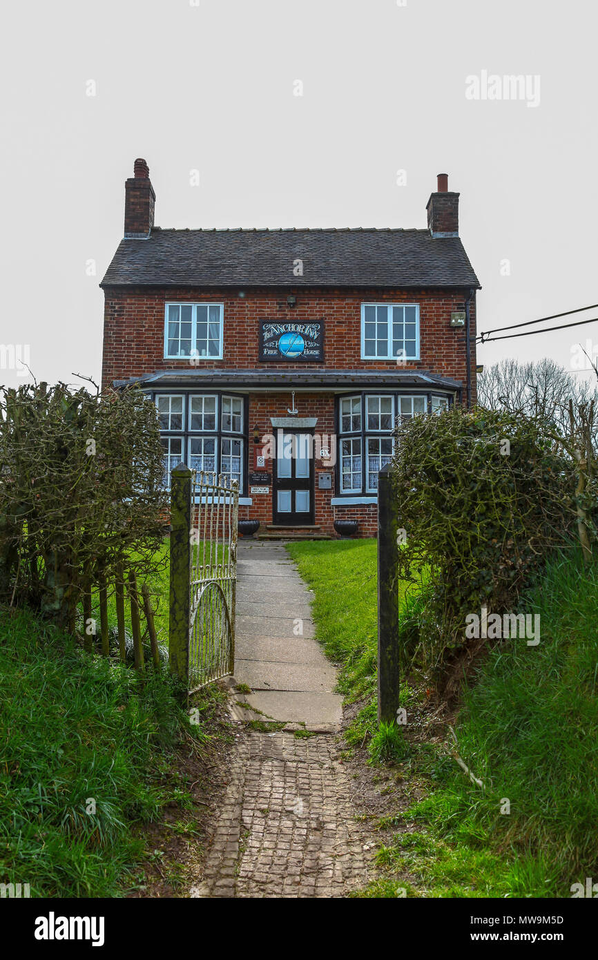 The Anchor Inn pub or public house, situated on the side of the