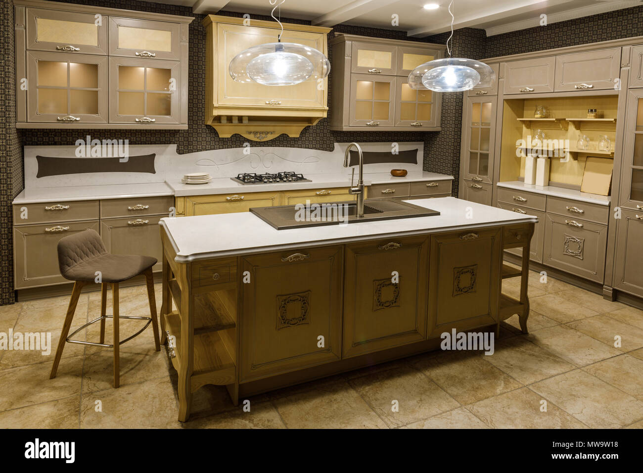 Interior of modern kitchen with beige cabinets Stock Photo - Alamy