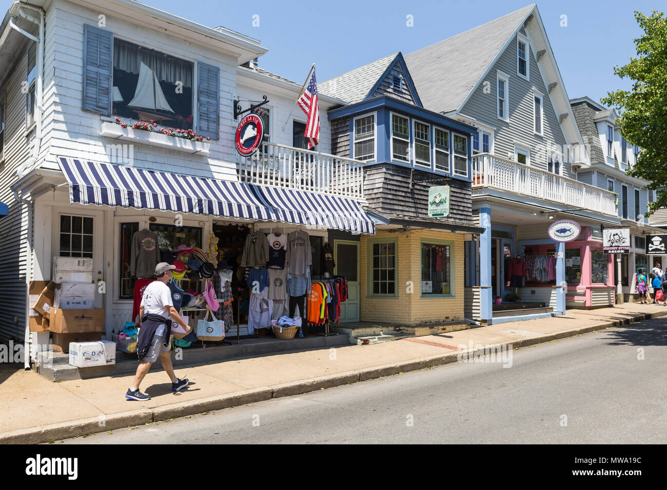 Shops and restaurants line Circuit Avenue, the main shopping district in downtown Oak Bluffs, Massachusetts on Martha's Vineyard. Stock Photo