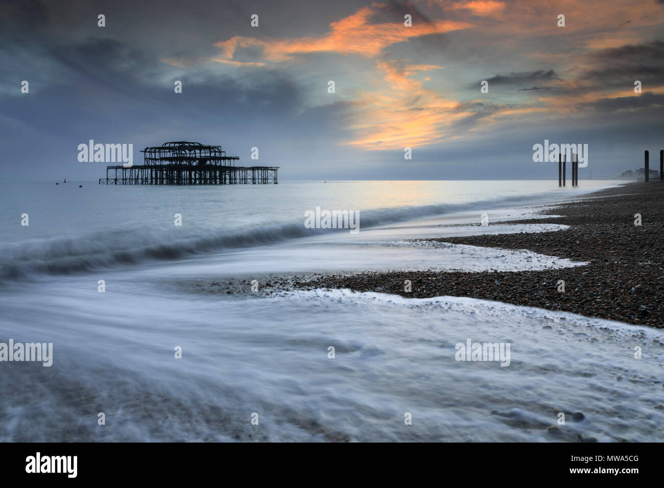 The remains of West Pier captured from Brighton Beach. Stock Photo