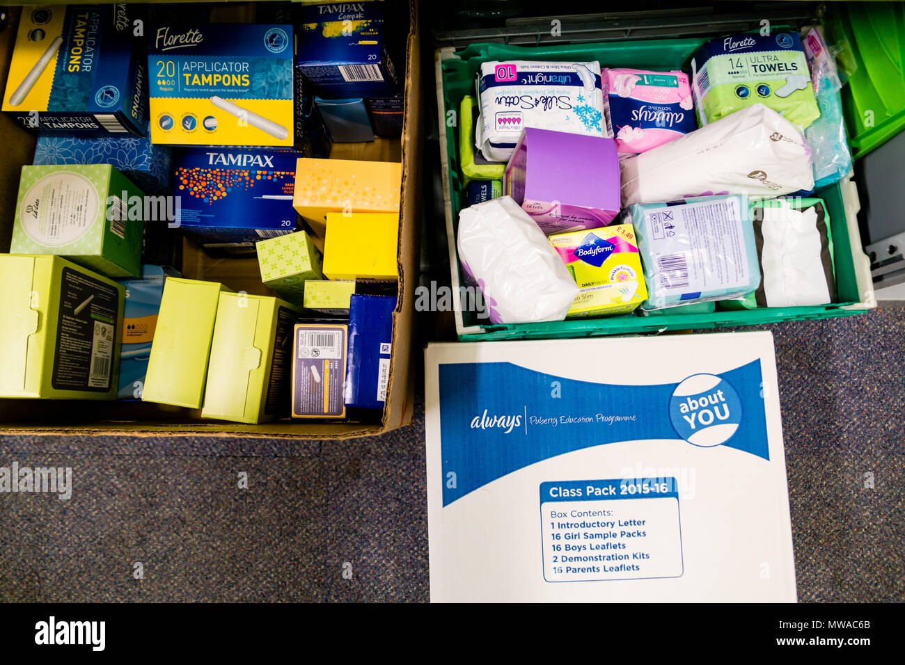 A local church food bank (part of Trussell Trust) dealing with period poverty - a selection of the sanitary products that have been donated Stock Photo