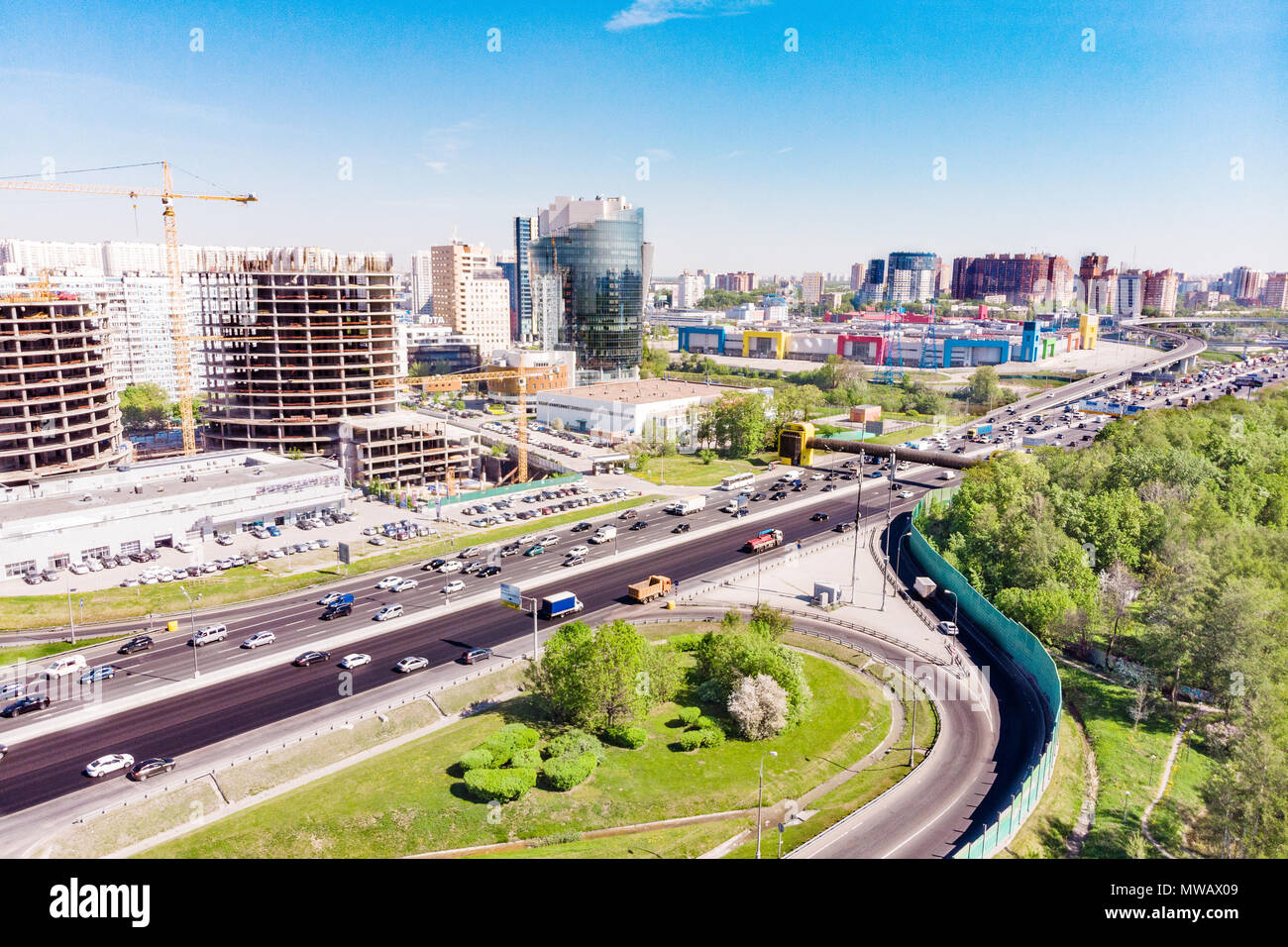 Aerial view of a freeway intersection. Road junctions in a big city ...
