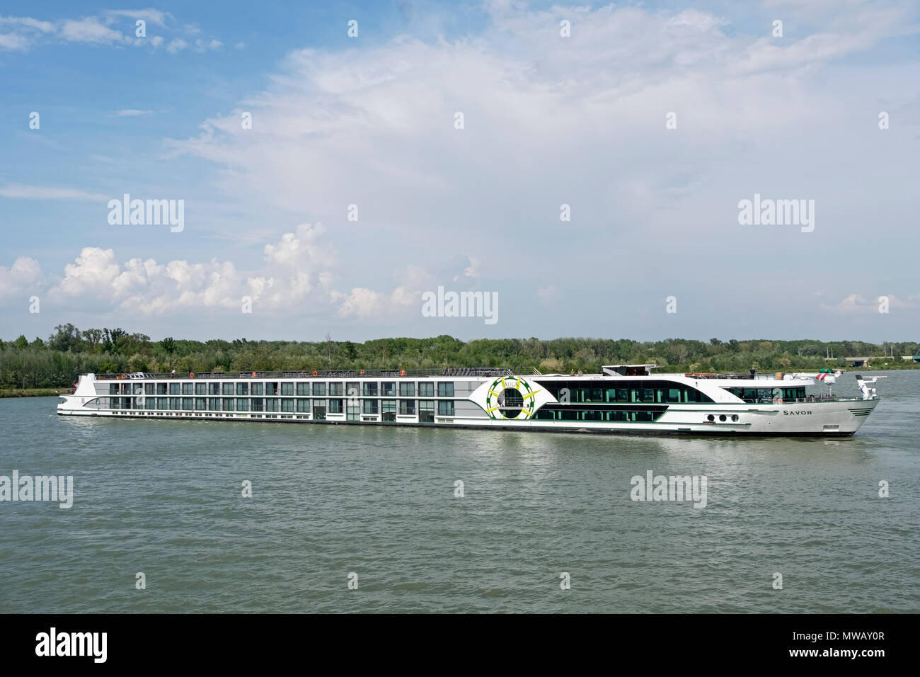 The Tauck Savor, a luxury river cruise ship turning on the Danube River