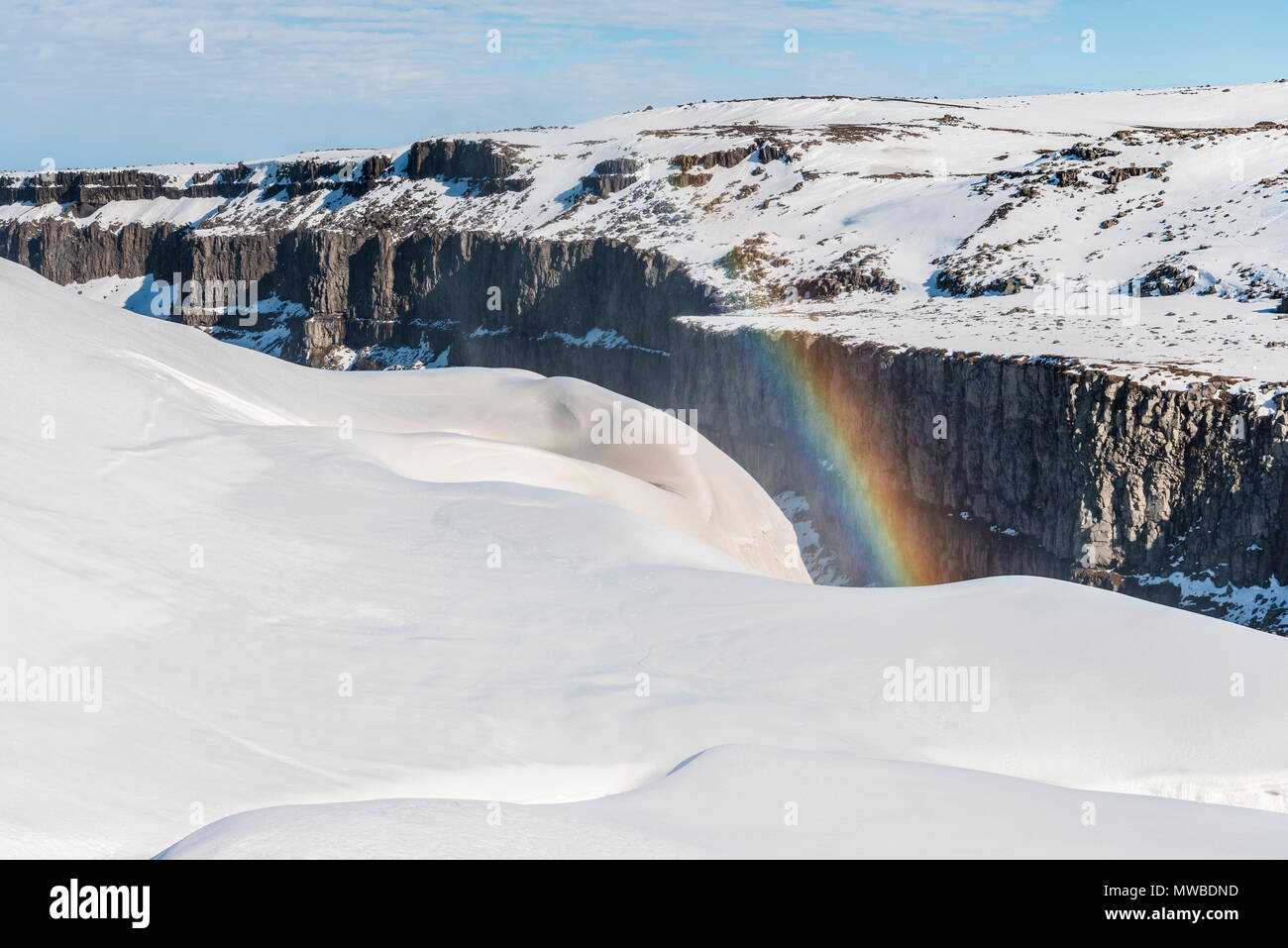 Jökulsárgljúfur gorge, cliffs, rainbow at Dettifoss waterfall in winter, North Iceland, Iceland Stock Photo