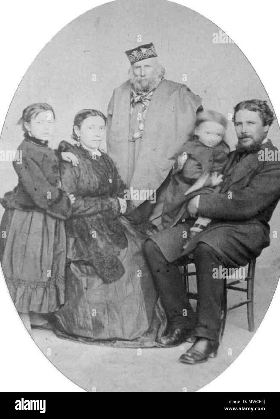 . English: Figure 1.--Here we have one of the most important protagonist of the Italian Risorgimento: Giuseppe Garibaldi (1807-1882). The photo was taken about 1875. Left to right we can see: daughter Clelia, wife Francesca Armosino, Giuseppe Garibaldi, little grandchild Manlio and son Menotti. 1875. Unknown 246 Giuseppe Garibaldi (1807-1882) Stock Photo