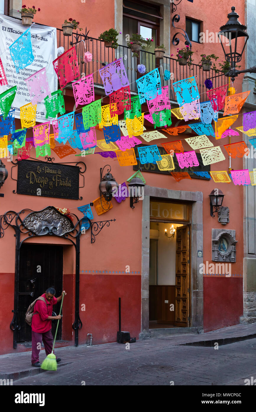 Paper cutout flags decorate the streets during EASTER WEEK - GUANAJUATO, MEXICO Stock Photo