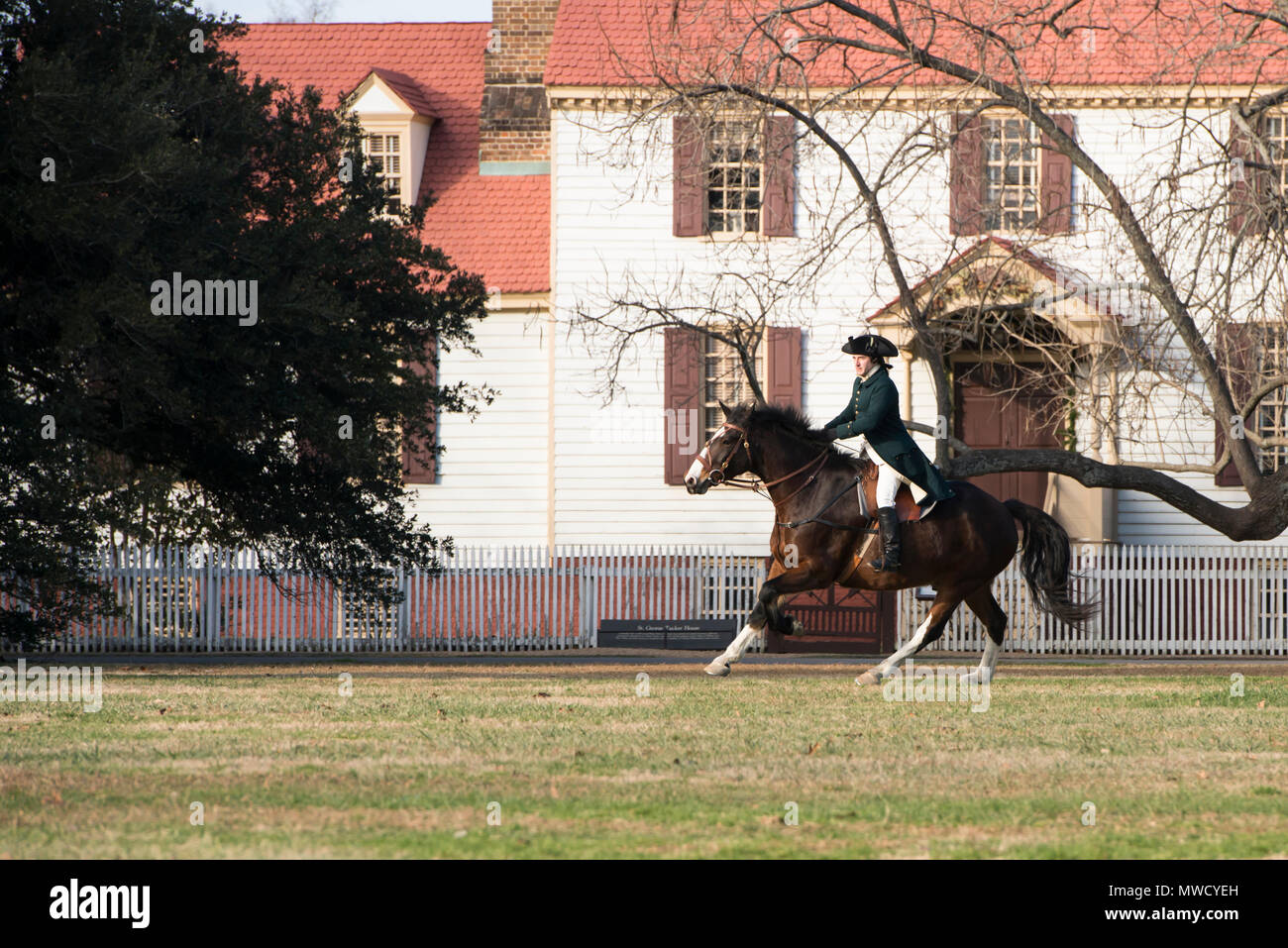 Marquis de Lafayette on horseback. Living history reenactment at Colonial Williamsburg. Out for an exercise and training ride in the Virginia. 4 of 5. Stock Photo