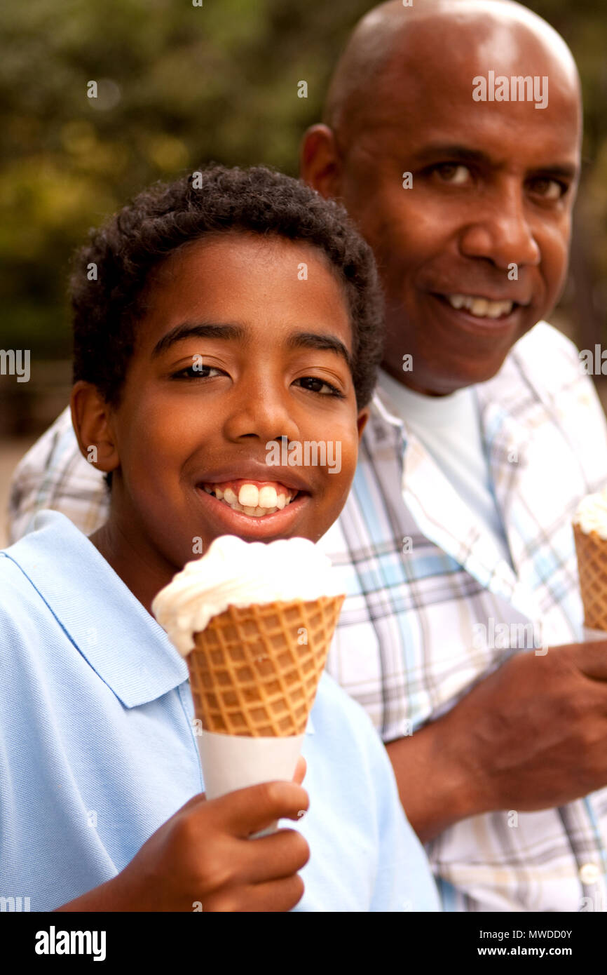 Father and son eating ice cream Stock Photo Alamy