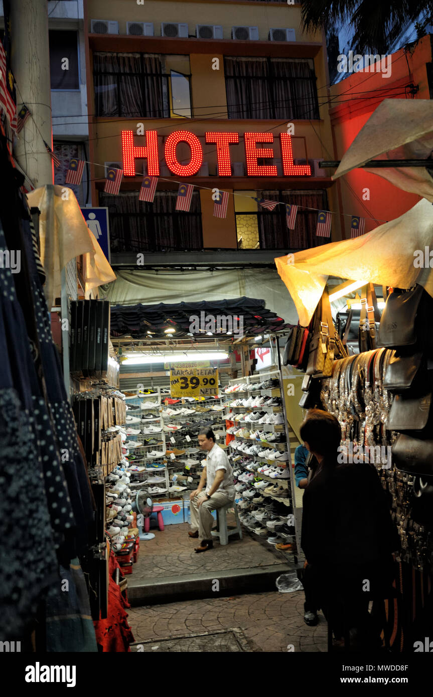 Hotel and market in Petaling Street (Chinatown) at night, Kuala Lumpur, Malaysia Stock Photo