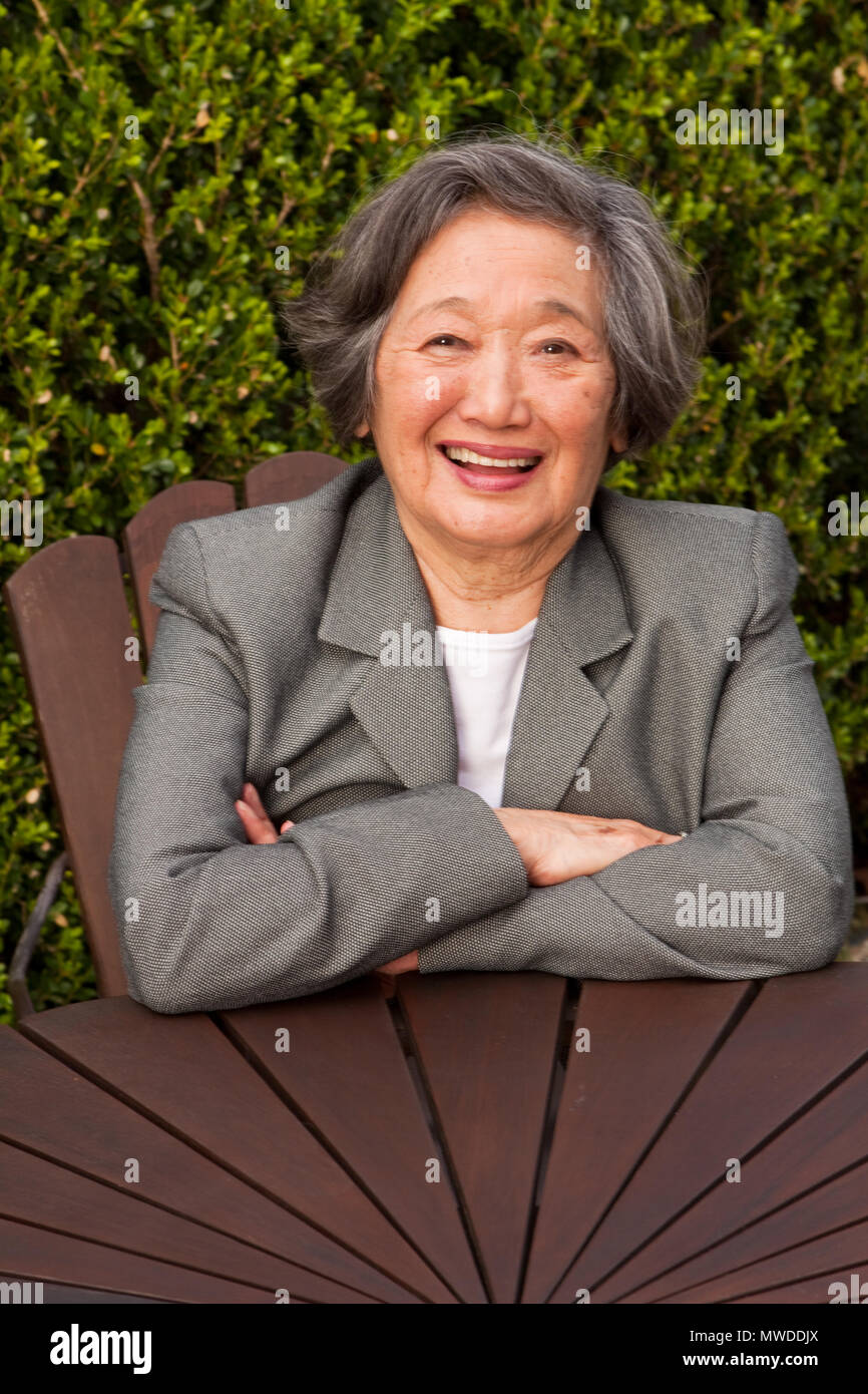 Portrait of happy Asian woman smiling. Stock Photo
