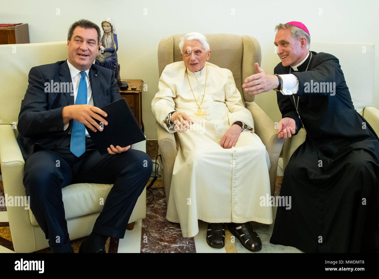 Vatican, Vatican City. 01 June 2018. The retired pope Pope Benedict XVI (C)  welcomes Markus Soeder (L) of the Christian Social Union (CSU), Premier of  Bavaria, for a conversation. On the right