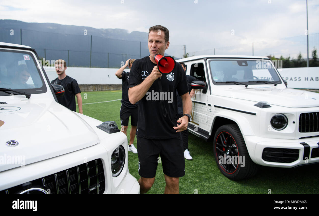Appiano / Sudtirol. The German national football team with eleven new,  branded in the Best Never Rest campaign look Mercedes-AMG G63 Edition 1  models as part of a shoot by DFB General