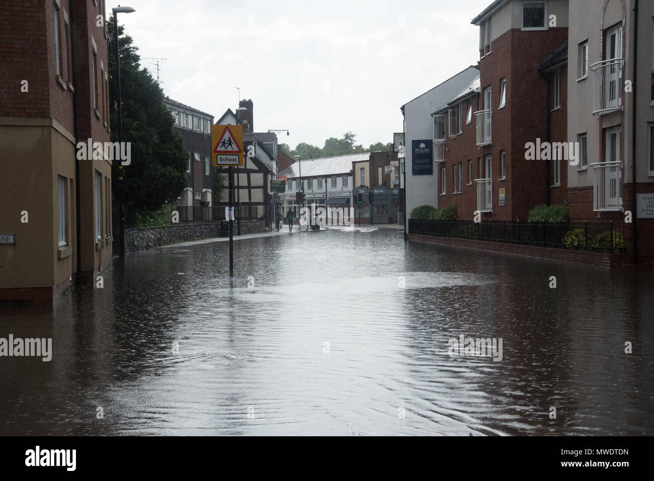 Shrewsbury, Shropshire, UK. 1st June 2018. Coleham, close to Shrewsbury town centre and the River Severn was hit by horrendous flash floods this afternoon. Within minutes, local shops were flooded and the road was eventually sealed off by the fire brigade. Credit: Richard Franklin/Alamy Live News Stock Photo