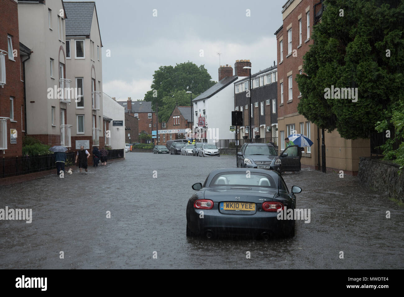 Shrewsbury, Shropshire, UK. 1st June 2018. Coleham, close to Shrewsbury town centre and the River Severn was hit by horrendous flash floods this afternoon. Within minutes, local shops were flooded and the road was eventually sealed off by the fire brigade. Credit: Richard Franklin/Alamy Live News Stock Photo