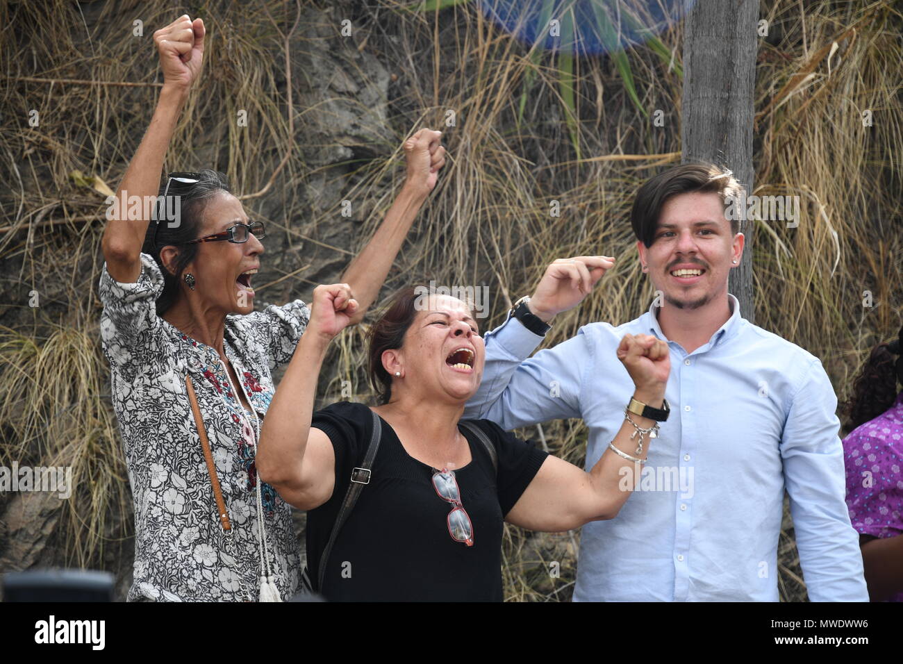 People celebrate and cries after seeing their relatives in buses outside Helicoide Jail in Caracas. The Government of Venezuela grants precautionary measures to political prisoners who were detained at the headquarters of the Bolivarian Intelligence Service (SEBIN). 39 political prisoners were released with precautionary measures by the government of Nicolas Maduro. Still more than 150 people continue behind bars for having participated in protests against the government. Among those released is the former Mayor of San Cristobal, state tachira, Daniel Ceballos; Retired General Angel Vivas and  Stock Photo