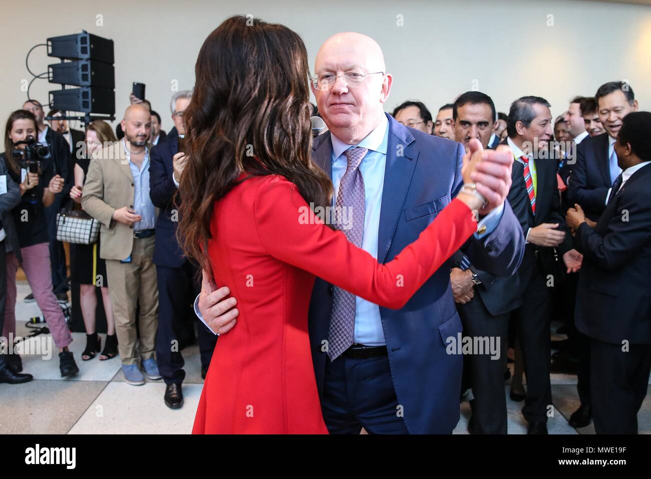 New York, New York, USA. 1st June, 2018. The ambassador of Russia to the  UNO Vasily Nebenzya and Russian singer Zara during a 2018 World Cup  presentation event at the United Nations
