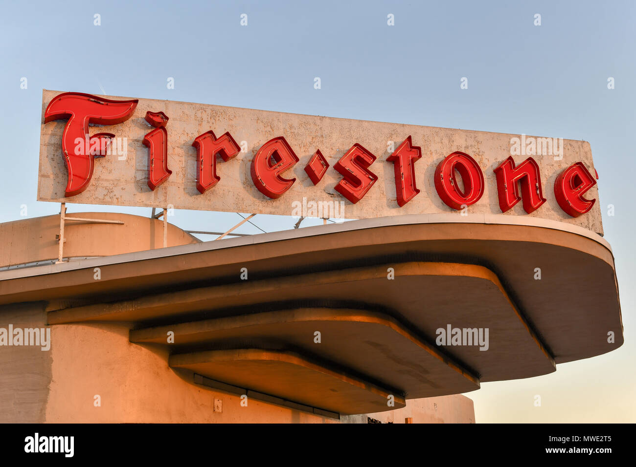 Miami, Florida - April 28, 2018: Vintage Firestone logo on a building. Firestone is an American tire company founded in 1900 and the company was sold  Stock Photo