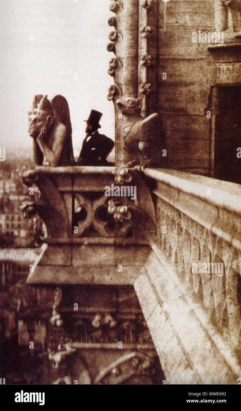 . A picture taken by en:Charles Negre in en:1853. Of Henri Le Secq near the 'Stryge' chimera on en:Notre Dame de Paris. 1853. Author: Charles Nègre; Uploader: Dfrg.msc 271 Henri Le Secq near a Gargoyle Stock Photo