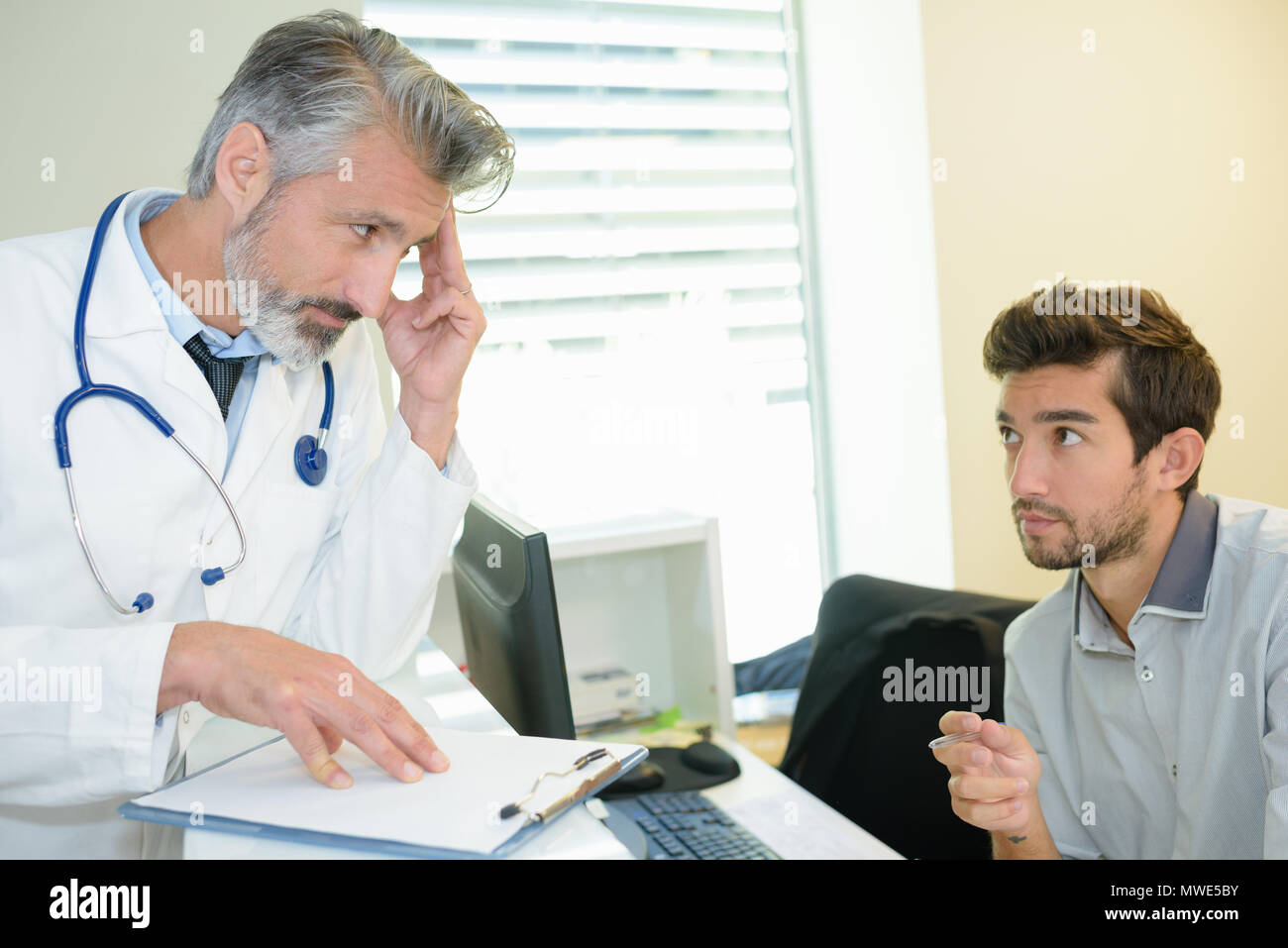 Hesitating hi-res stock photography and images - Alamy